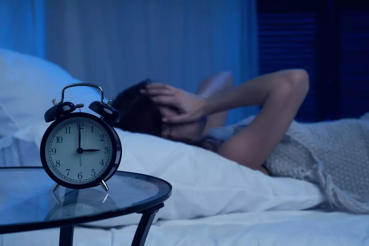 Stressed woman having insomnia