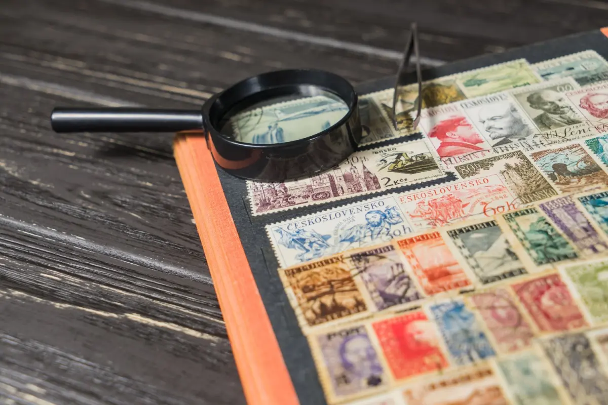 magnifier on stamp collection